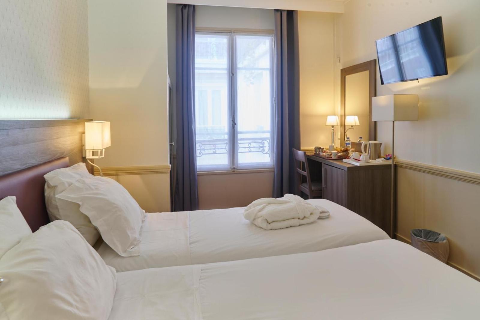 Hotel Poussin Paris Bagian luar foto